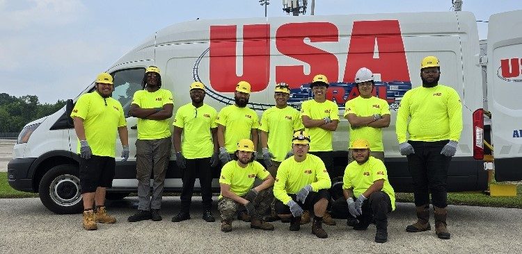 USA Rail crew with the company fleet